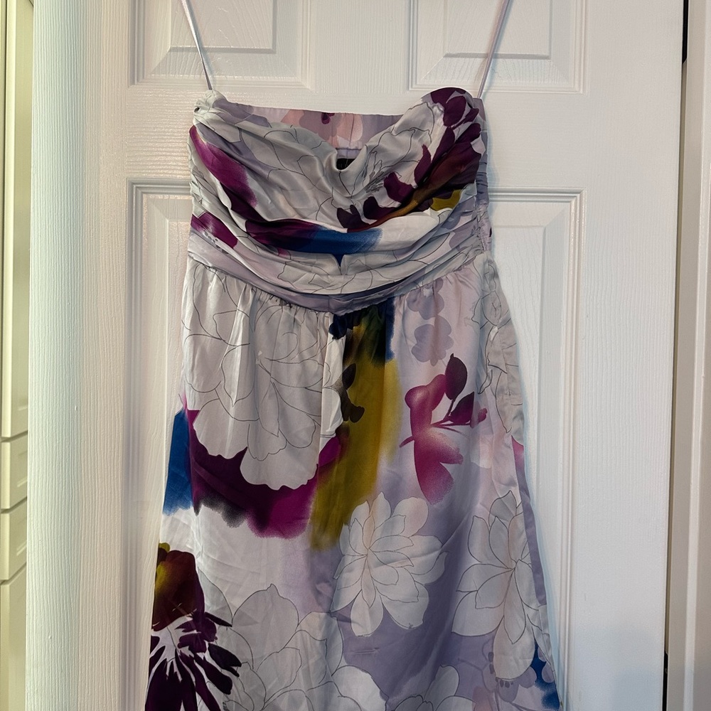 Tubetop floral soft satin knee length dress with ruched pleated bust.